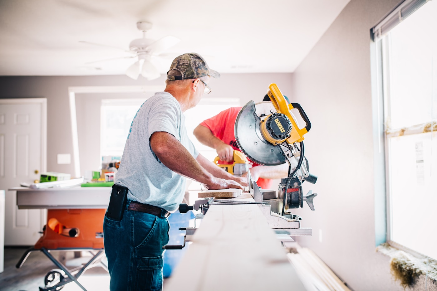 Two technicians working together on a job